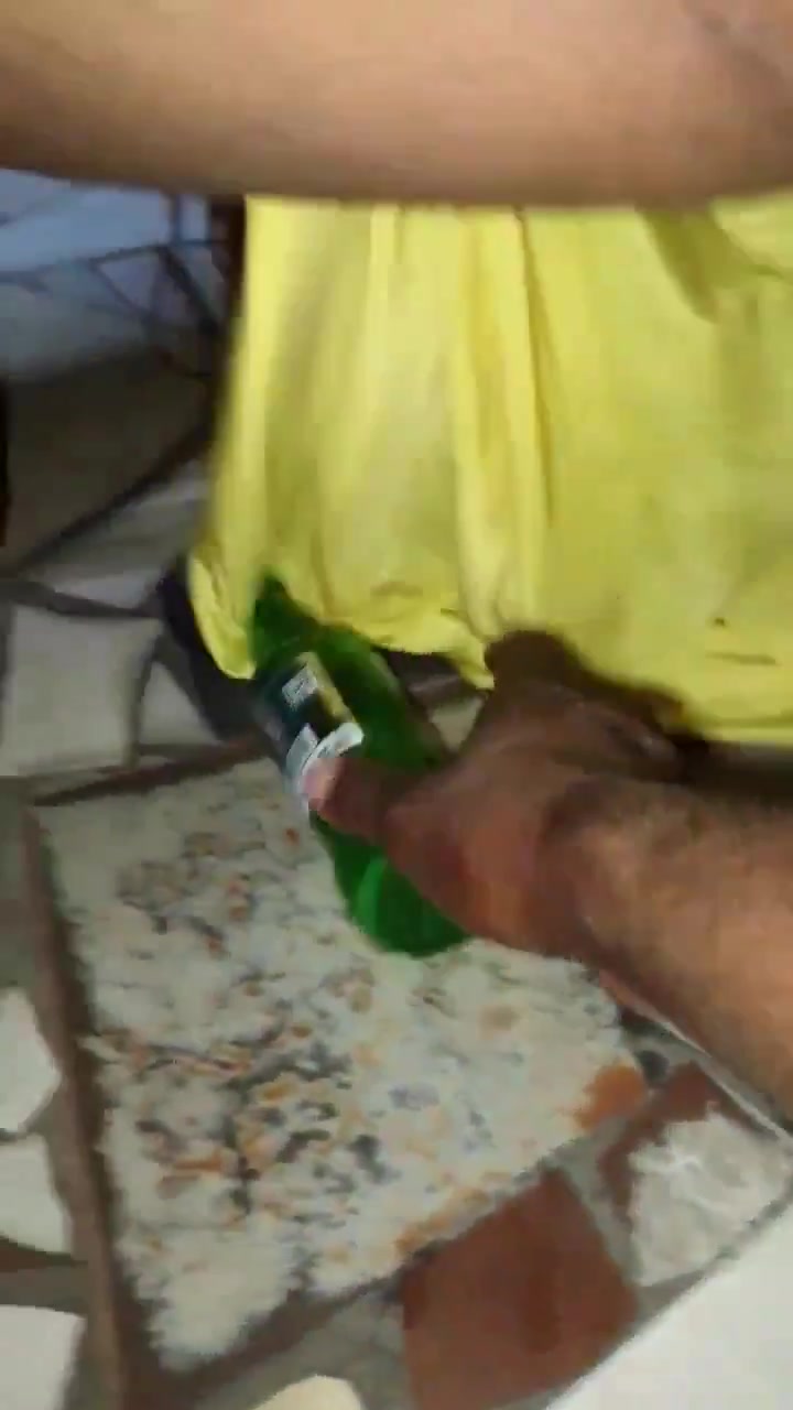Castle Lite bottle in the pussy on the dancefloor